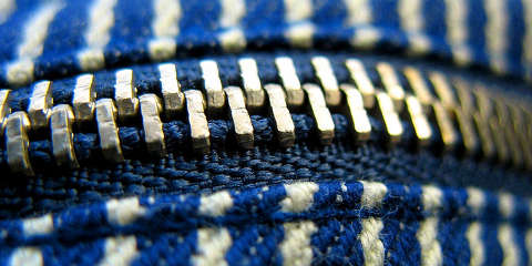 Zipper over blue tissue