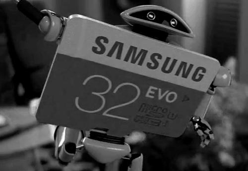 android robot and an SD card in black and white picture